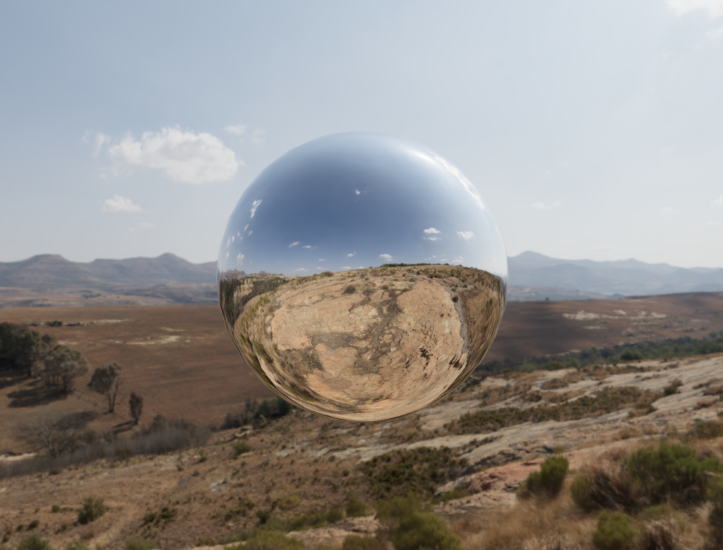 A high-resolution cubemap HDRI is rendered once it has loaded